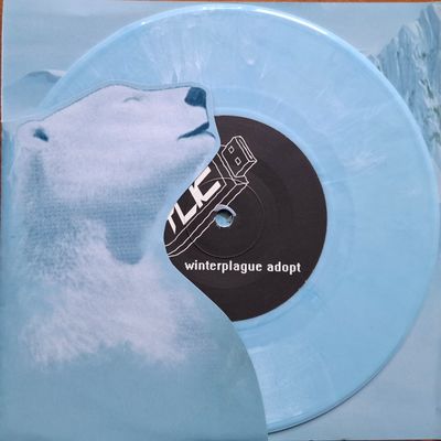 TLIC - Winterplague Adopt (Blue Marbled. Ltd. Die-Cut) Light Blue Marbled. Ltd. Edition. Die-cut cover (7" Excl) - SoundGround музикален магазин